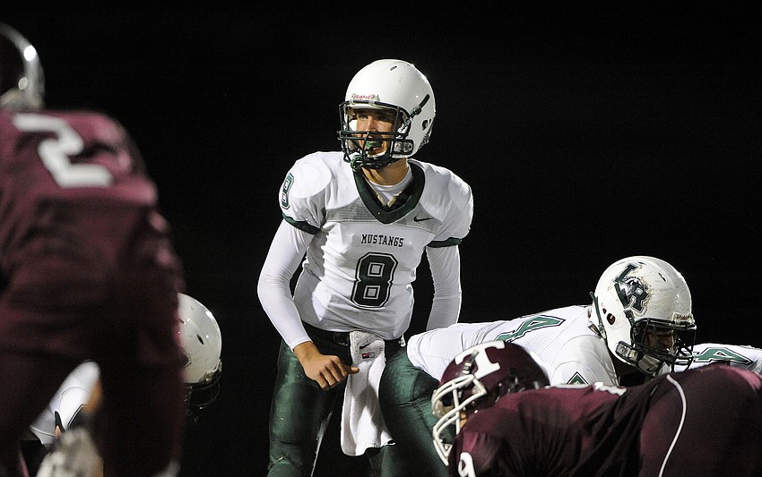 Lakewood Ranch sophomore quarterback Chad Rex looks back toward the sideline for the next play.