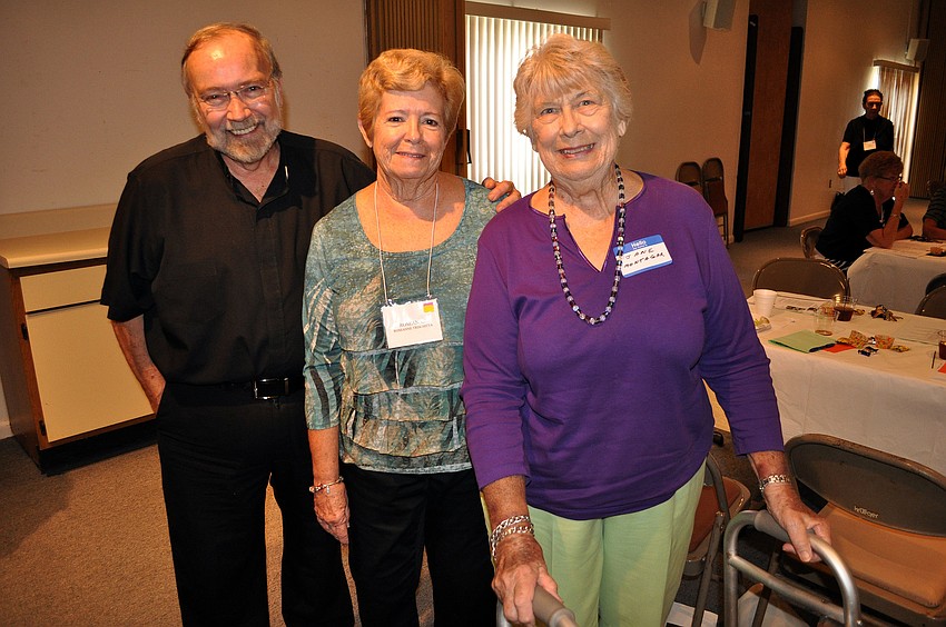 Msgr. Joseph Stearns poses with Roseanne Trischitta and Jane Montagar