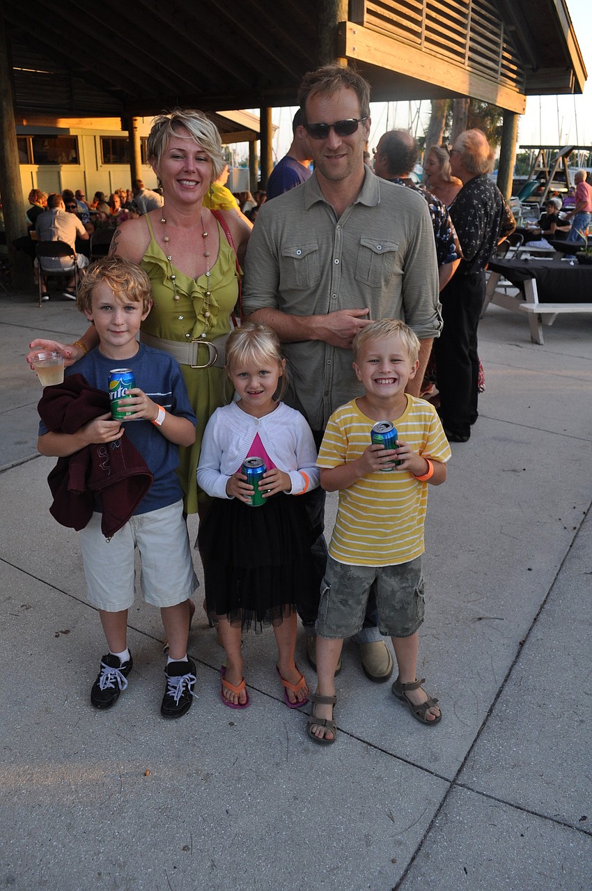 Dana and Mike Mathewson pose with their children Charlie, Georgia and Angus