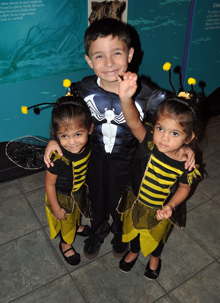 Christian Diaz, 4, with his twin sisters Elyse and Ava, 2
