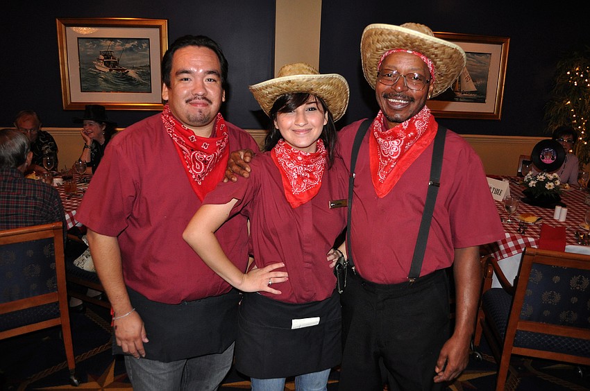 Bird Key Yacht Club employees Reymundo Sauceda, Leslie Lamb and James Williams got into the country spirit.