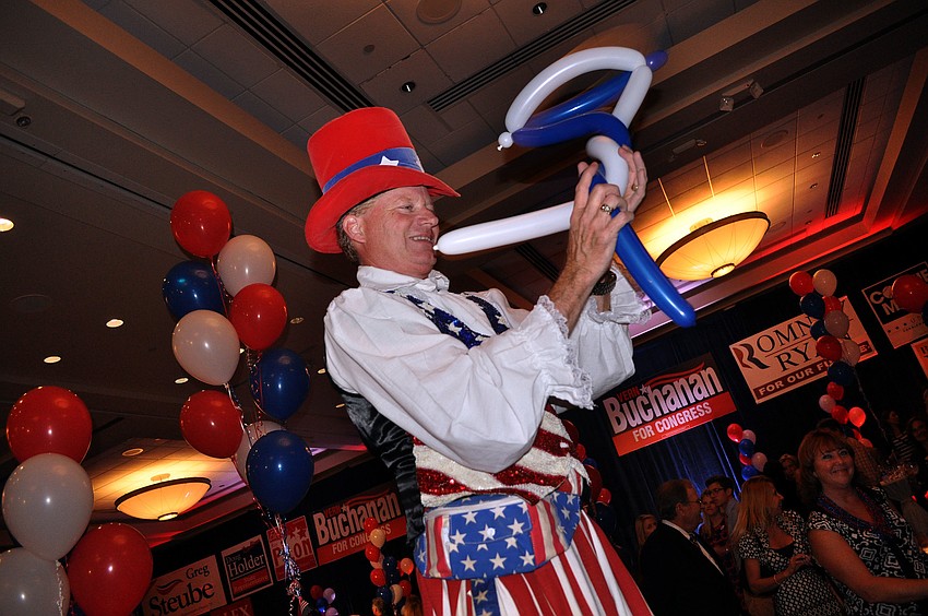 Billy Damon walked on stilts and made balloon creations Tuesday, Nov. 6, during the Republican Party of Sarasota Election Night Party at the Hyatt in Sarasota.