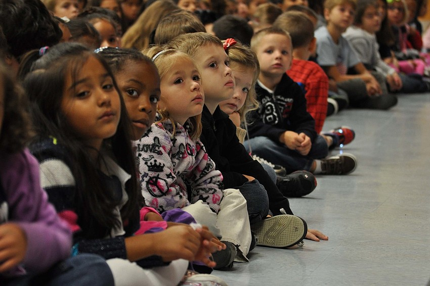 Children paid close attention.