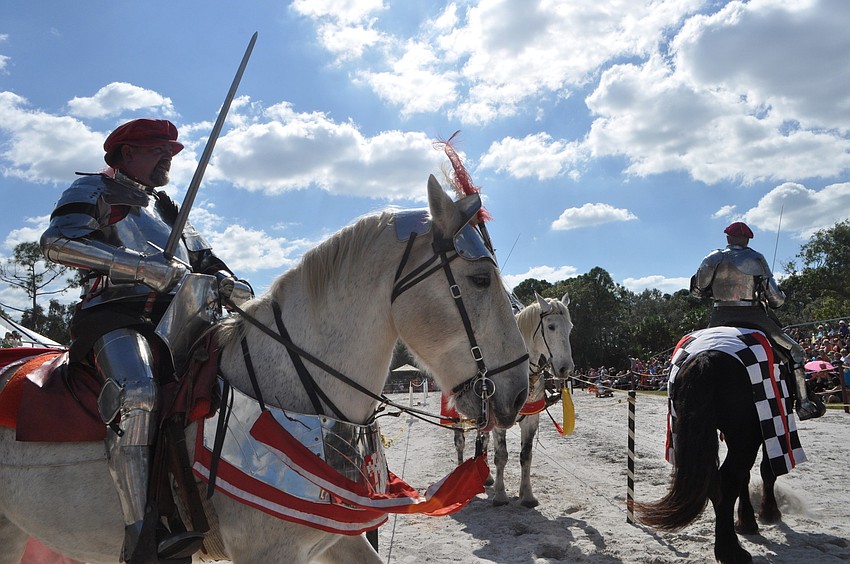 Riders prepare to joust.