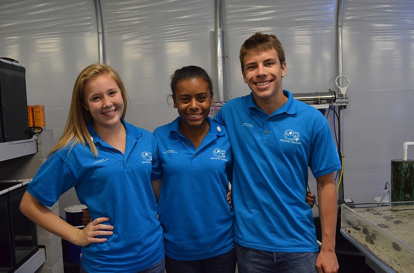 Taylor Gibson, Kendra Garcia and Viekson Van Wie are all interns. Students must take the Marine II class at Riverview to be an intern.