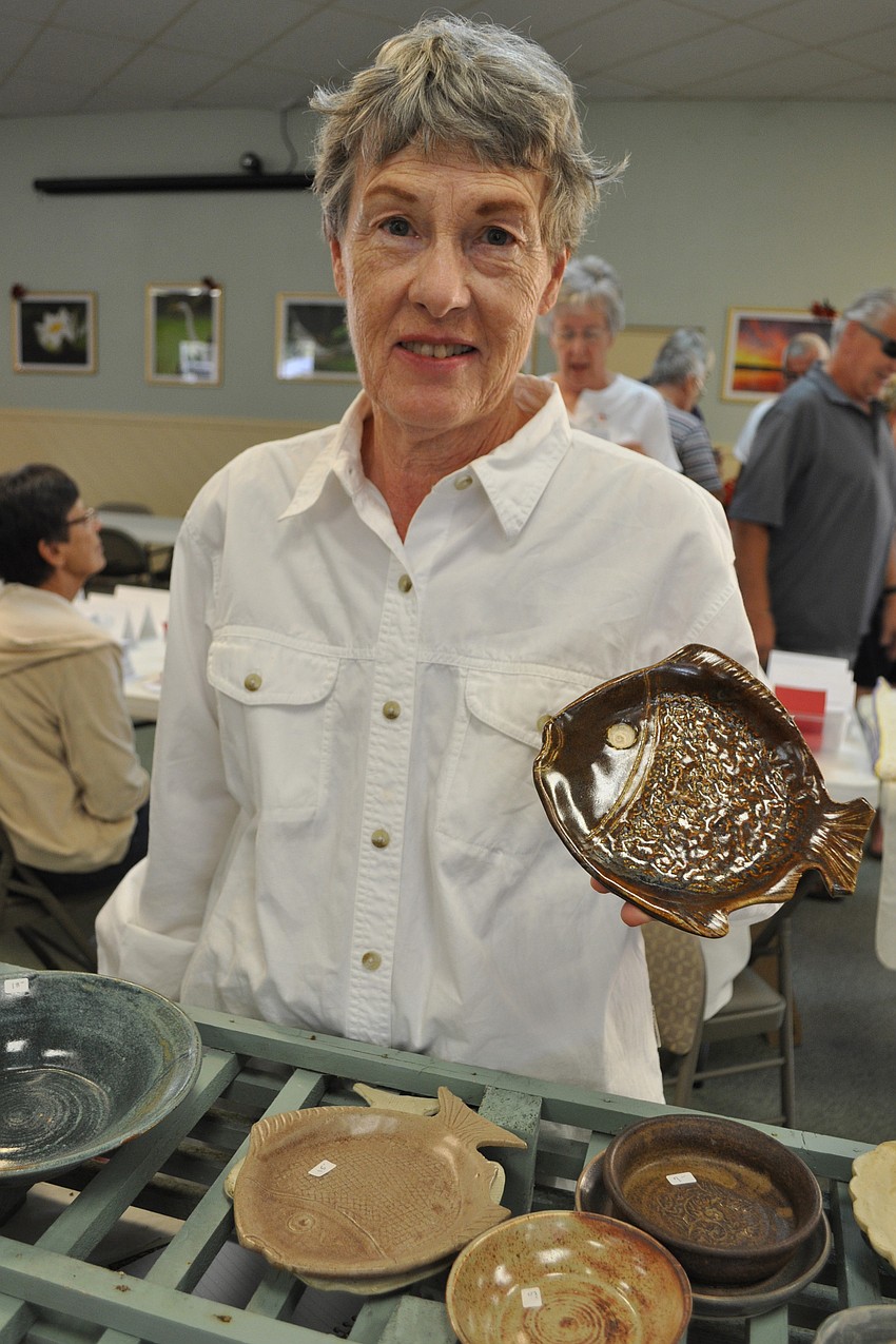 Lois Snow sold drawings and pottery.