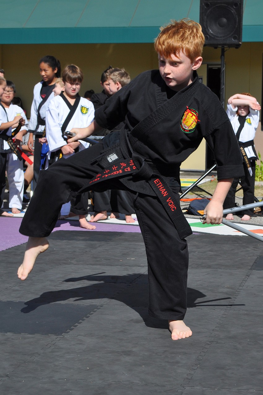 Ethan Boic, a student at Ming Wu Martial Arts, demonstrated how to use his nunchucks.