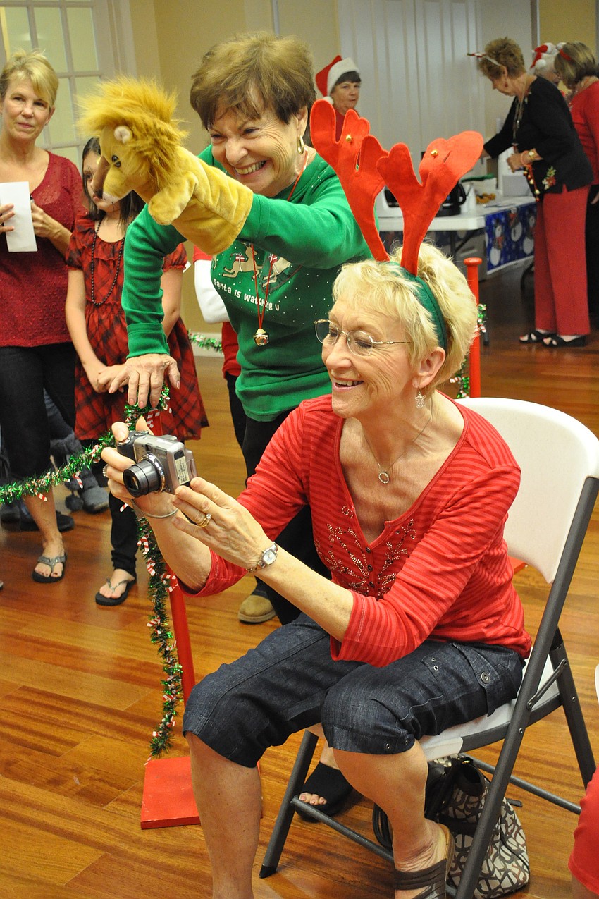 Jean Ott used a puppet to help Nancy Lively capture the perfect shot for families.