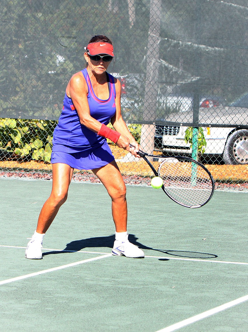 Katharine Girle goes for a backhand shot.