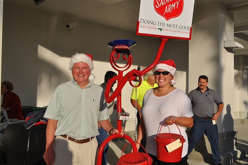 Jack Brill and his daughter, Vickie Brill, were the first Salvation Army bell ringers at the new store.