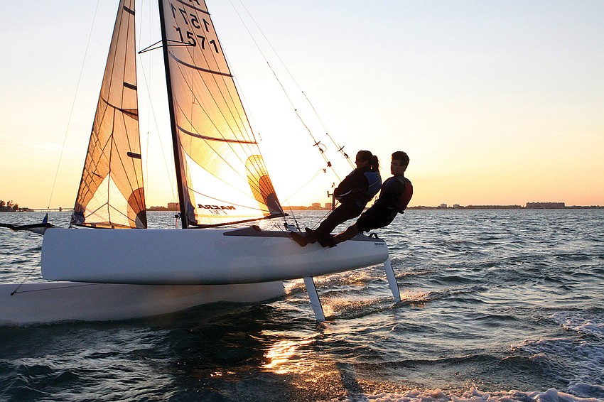 Jennifer LePatourel and Sam Armington practice sailing with the Sarasota Youth Multihall team.
