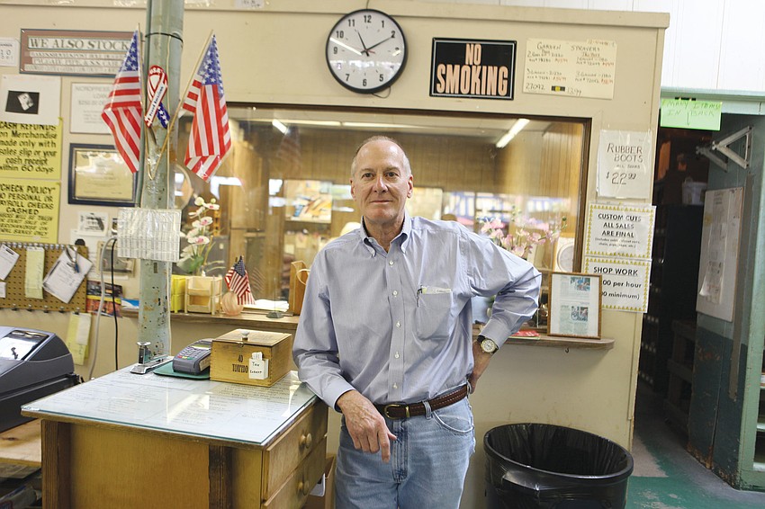 Jim Krill, owner of Sarasota Hardware & Paint Co., poses near the back of the store.