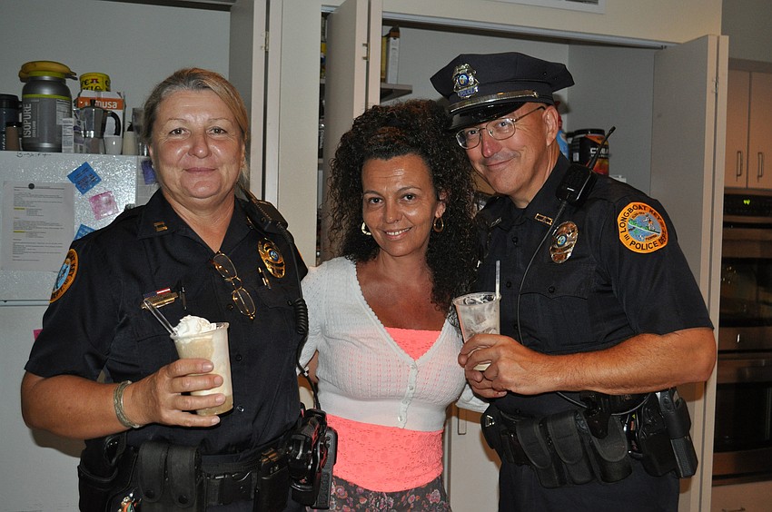 Longboat Key Police Captain Monica Quarmby enjoyed a refreshment break Aug. 10 with Lisa Silvertooth, human resource manager for the town of Longboat Key, and Patrol Officer John Thomas during the inaugural Root Beer Float Friday.
