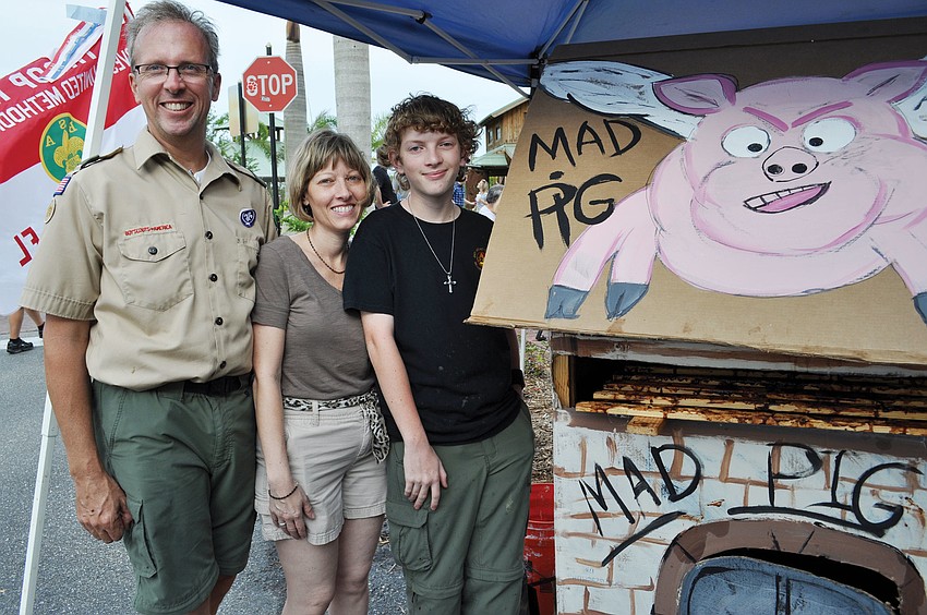 River Club resident Michael Meiser, right, served up his best barbecue with the help of his parents, Mike and Theresa, during the High on the Hog Barbecue Contest April 29. Published May 3, 2012.