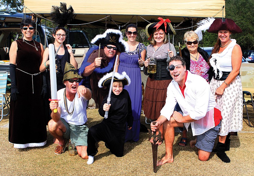 Rachel Roberts, Haley Gillis, instructor Martin Rivenbark, Brianna Naegeli and Lily Meaker practiced surfing during the Eternal Summer Summer Camp. Published July 19, 2012.