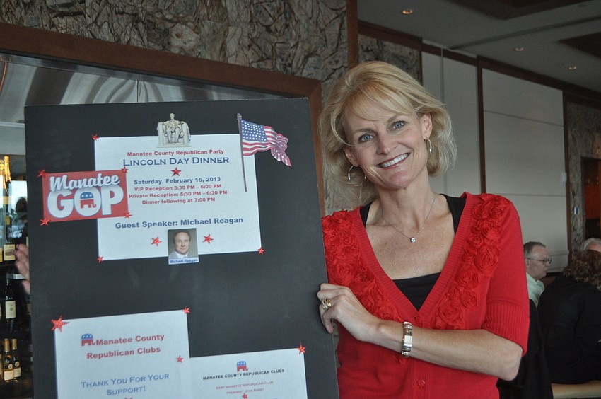Heather Goldin, from the Manatee Republican Club, drums up interest for upcoming speaker Michael Reagan.