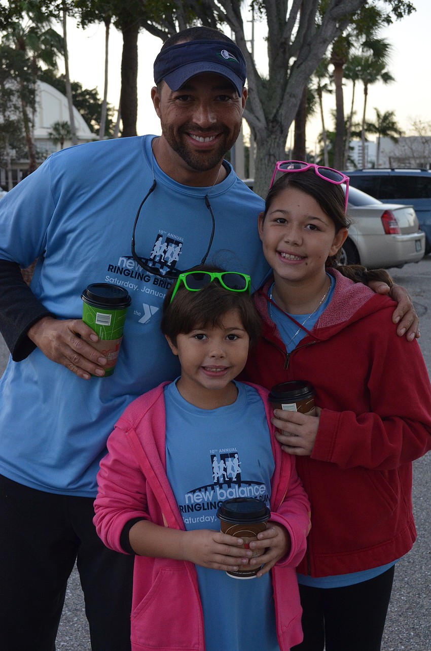 Darin Williamson ran the one-mile race with his daughters Ann and Olivia.