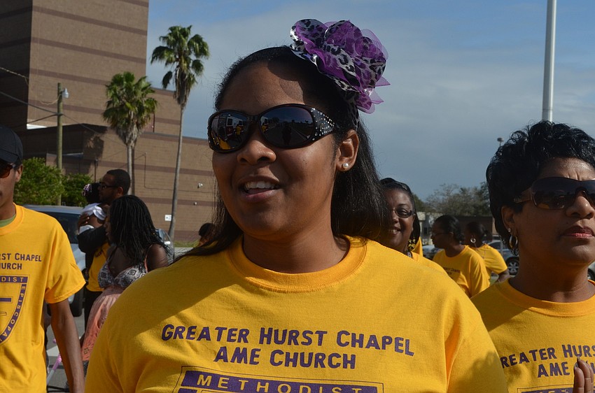 Eboni Curry sets off on the march from Booker High School.