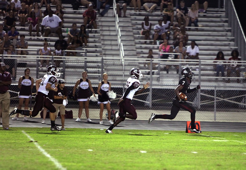 Riverviewâ€™s Noah Taylor, No. 21, and Lorenzo Dennie, No. 26, try to catch up to Braden Riverâ€™s Justin Ross, No. 7, Friday, Sept. 21 during the Braden River versus Riverview game at Braden River.