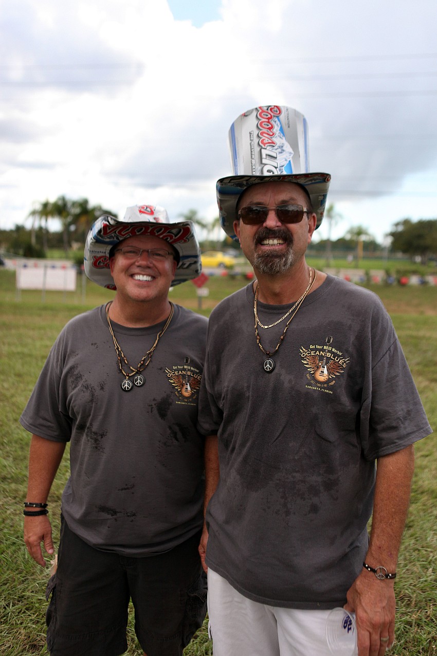 Jim Meyer and Charlie Tolson wearing their Coors Light hats that they ordered online.