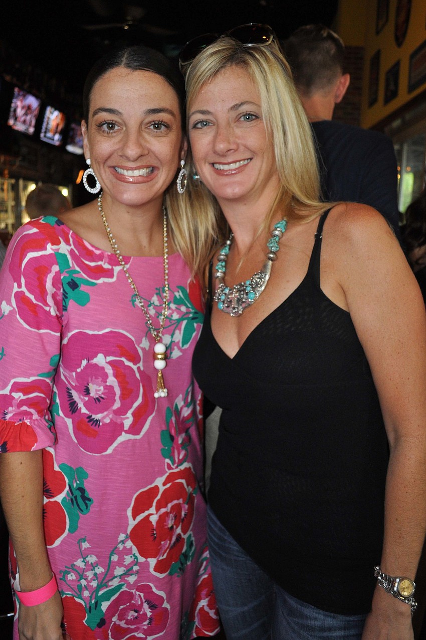 Sisters Lori Cashi-Haught and Tami Cashi had fun together.