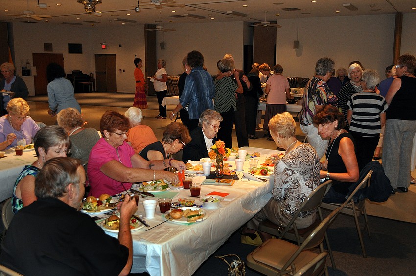 The Womenâ€™s Guild enjoyed catching up with friends over lunch Monday, Oct. 8, during their welcome back luncheon at St. Michael the Archangel.
