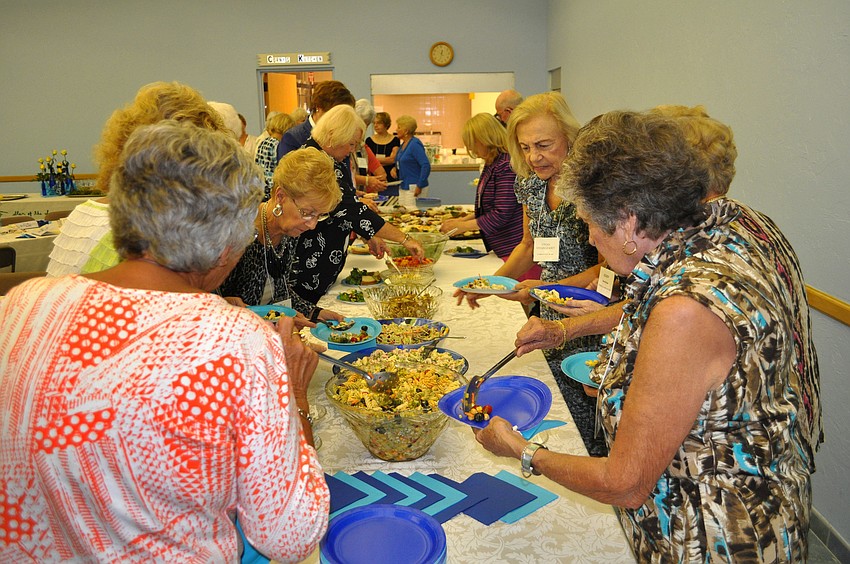Womenâ€™s guild members get lunch including sandwiches from Monterey Grill and salads made by women of the guild.