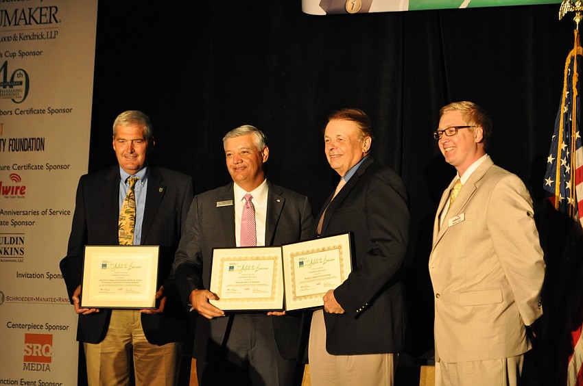 Dr. Robert Hirsch of Lake Eerie College of Osteopathic Medicine, Ernie Withers of Mercedes Benz and Dr. Larry Thompson of Ringling College accept their honors for the Investing in the Future award.