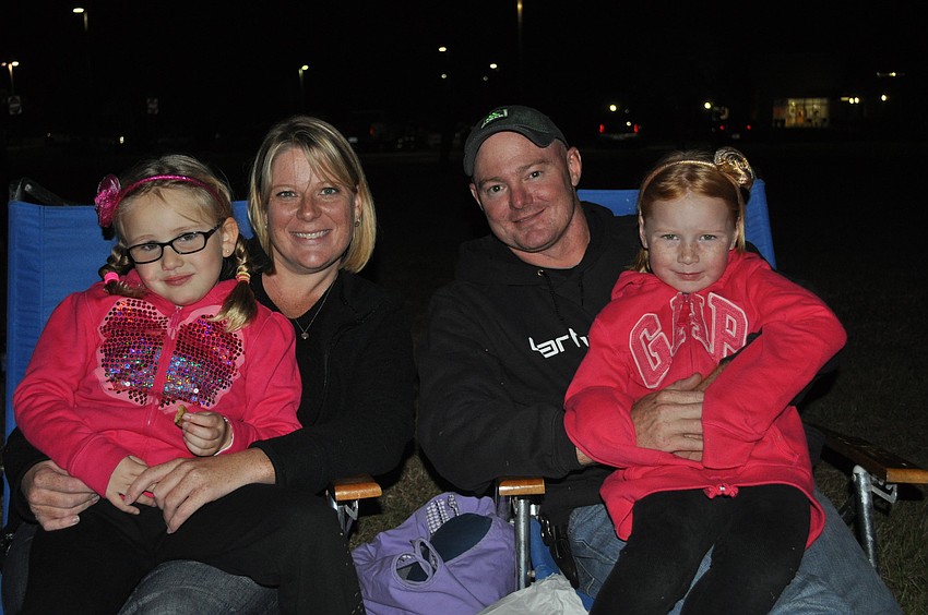 Jessica Pollard held Sophia Eastman while Matt Eastman held Abby Pollard.