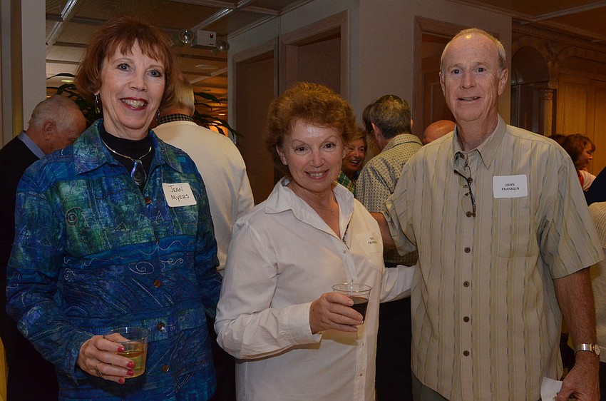 Jean Myers stands with Sue and John Franklin