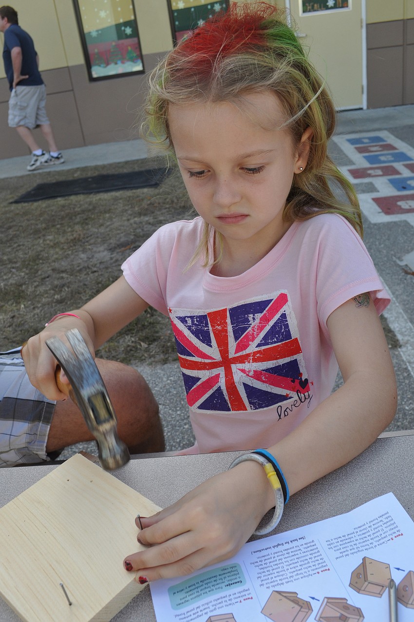 Ellie Jo Lake, 7, made a birdhouse.