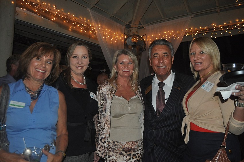 Allie Hueter of Building Connections, Kelly Dixon of Longboat Limousine, Ramona Glanz and Andrew Vac of National Awards of Florida Inc., Dawn Mims, executive vice president of the Longboat Key Chamber of Commerce