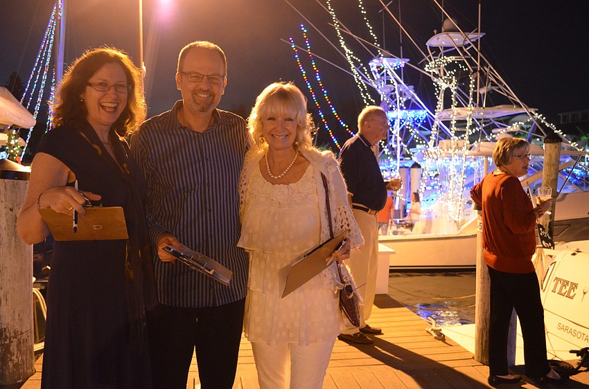 Grace and Michael Carlson and Rose Pantich judged which boats had the best display based on innovation and creativity.