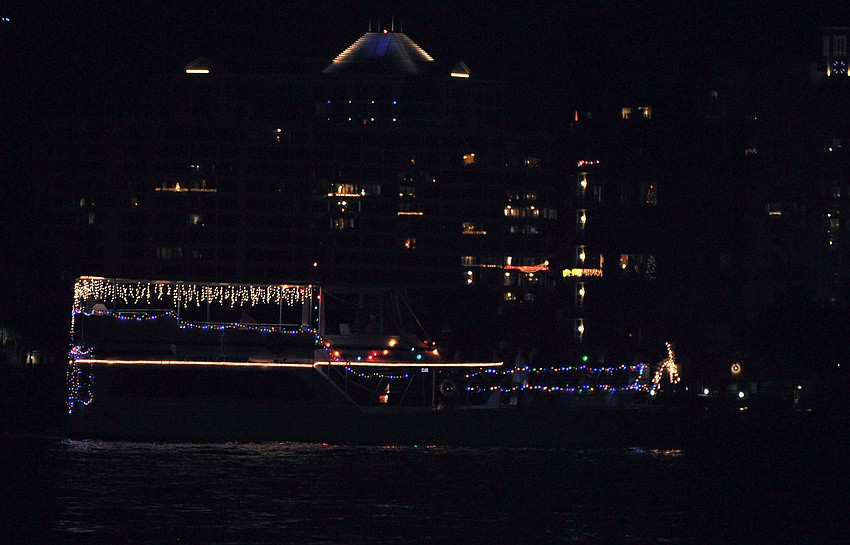 This boat featured icicle lights, multicolored lights and white reindeer at the bow.