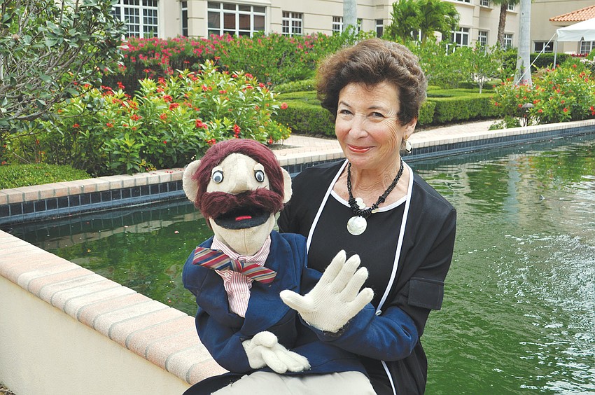 Jill Ross poses with the first puppet she built, which she named Jerry. Ross built the puppet using Jim Hensonâ€™s technique.
