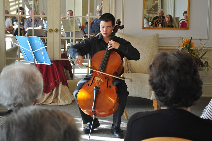 Cellist Seth Biagini, of The Julliard School and a Sarasota Music Festival student, performed June 13 in a special concert at the promenade.
