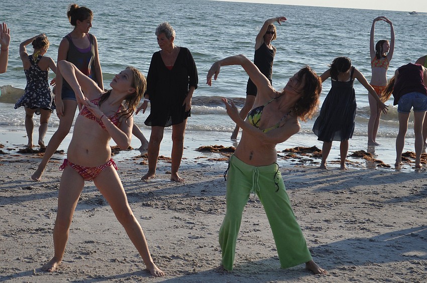 Emerald Eldridge and Lynn Hocker participated in the third annual summer flash mob June 30 on Lido Key Beach.