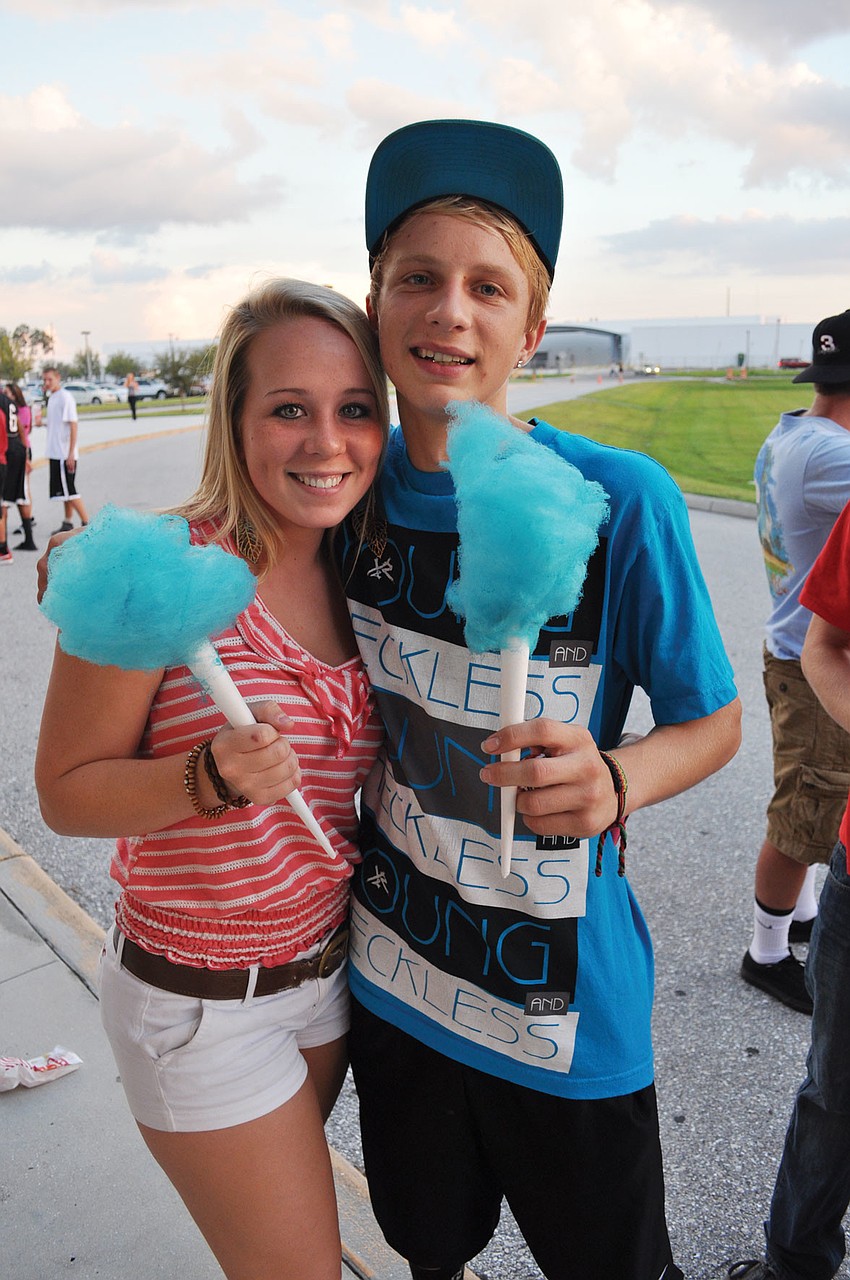 Brianna Douglas and J.C. Hooper enjoy cotton candy at Braden River High School's bonfire Sept. 27. Published Oct. 4, 2012.