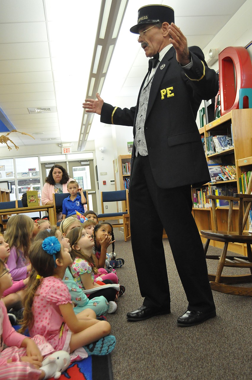 Patrick Sanders animates the story fro the children.