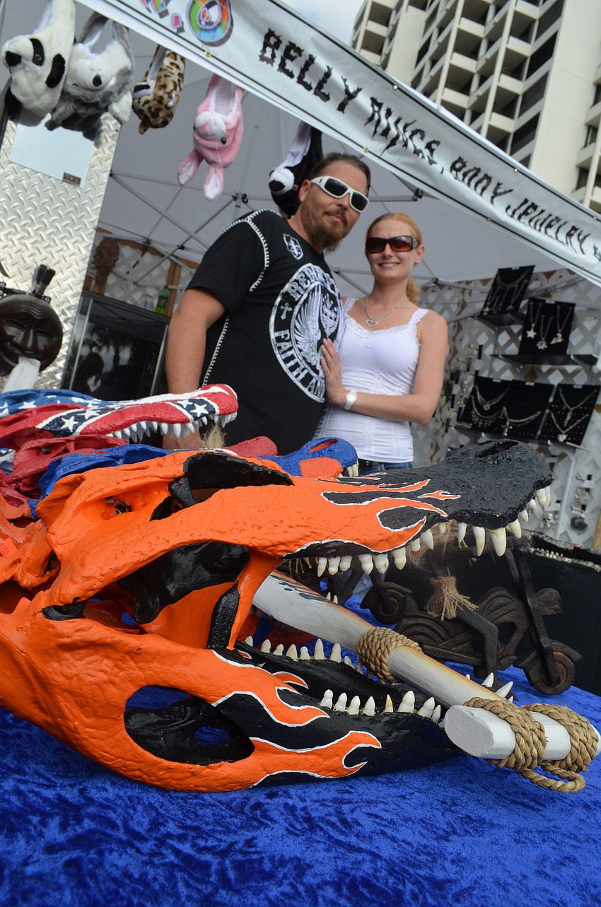 Husband and wife Charles Jury and Cassie Kramer sold hand painted alligator heads and boot jewelry.