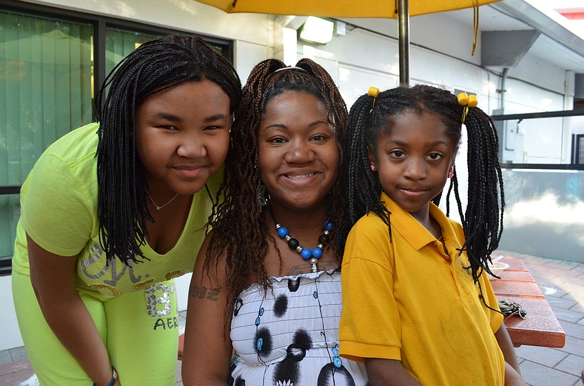 Zandy Sanders with her mother Shakeyla Dozier and little sister Shaiya Dozier.