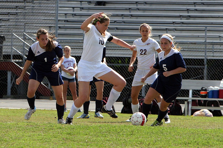 Riverviewâ€™s Allison Jones, No. 10, works to get the ball away from North Port.