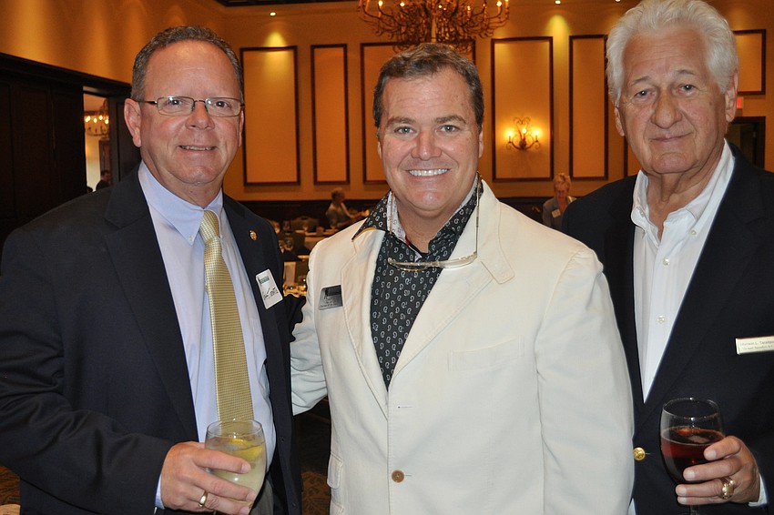 Gary Tibbetts of Congressman Vern Buchananâ€™s office with Tommy Klauber of Polo Grill and Bar, also the 2013 Lakewood Ranch Business Alliance Chairman of the Board, and Sherwin Taradash of Michael Saunders & Company
