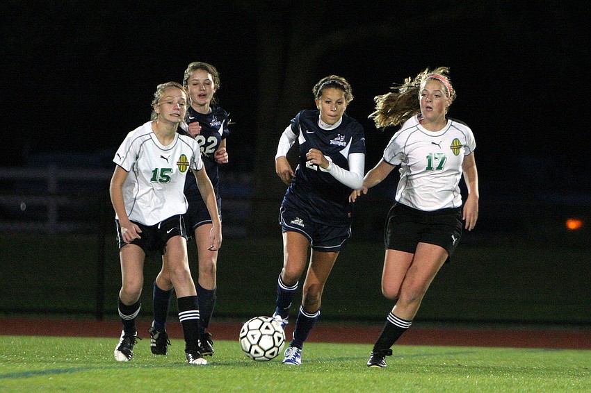 Shorecrest's Nicole Levine, No. 15, ODAâ€™s Katie Lang, No. 22, ODAâ€™s Juliet Onufrak, No. 20, and Shorecrest's Sarah Zolper, No. 17, all run after a lose ball.
