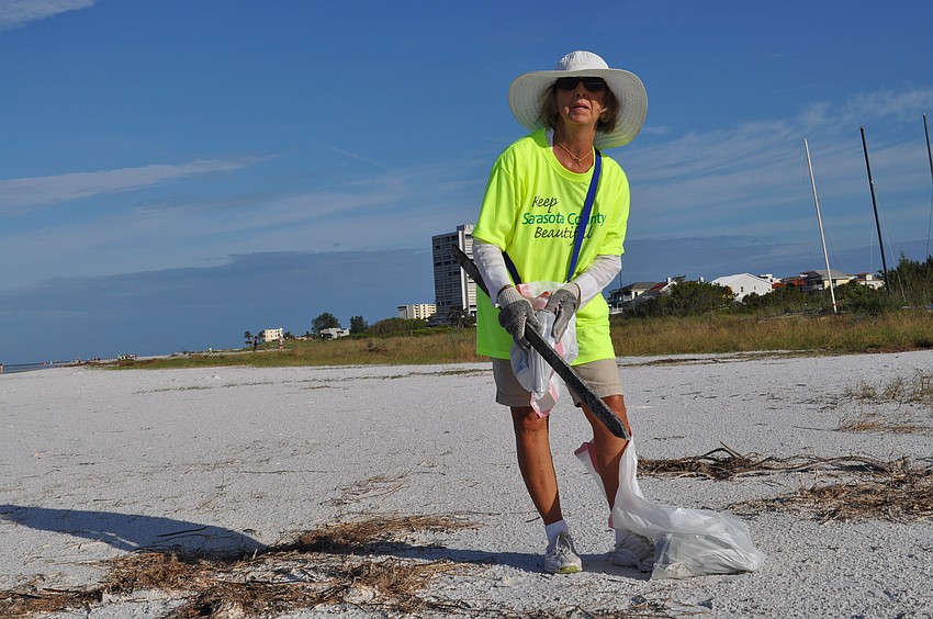 This is the second Coastal Cleanup for SKA board member Joyce Kouba, and she took the route close to dune vegetation where high tide can deposit trash.