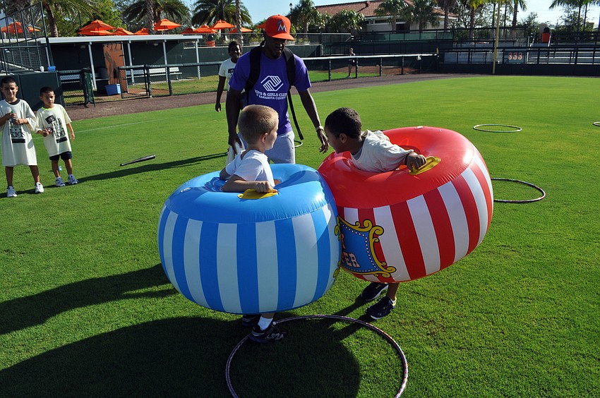 Michael Guchno and Ethan Alexander square off in sumo-like suits.