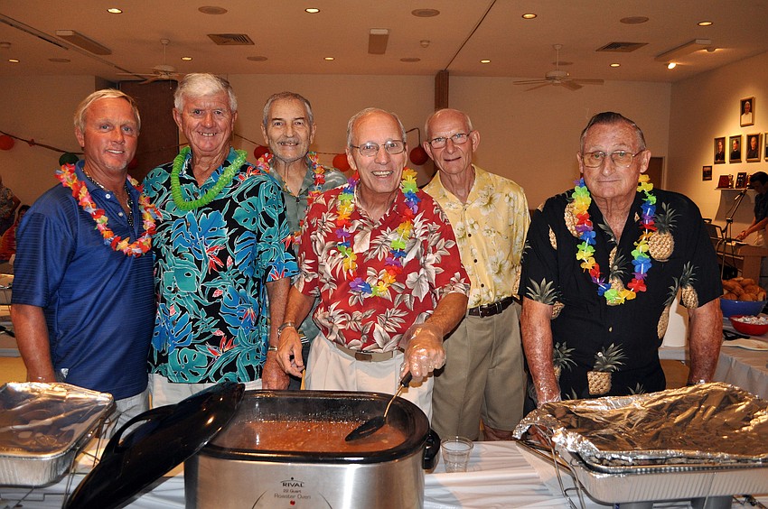 Rick Sanetti, Jack Burnham, Jim Dahamann, Bill Palmer, Roger Watercutter and Leo Seng all served up food Saturday, Sept. 29 at the Knights of Columbus Annual Luau at St. Michael the Archangel.