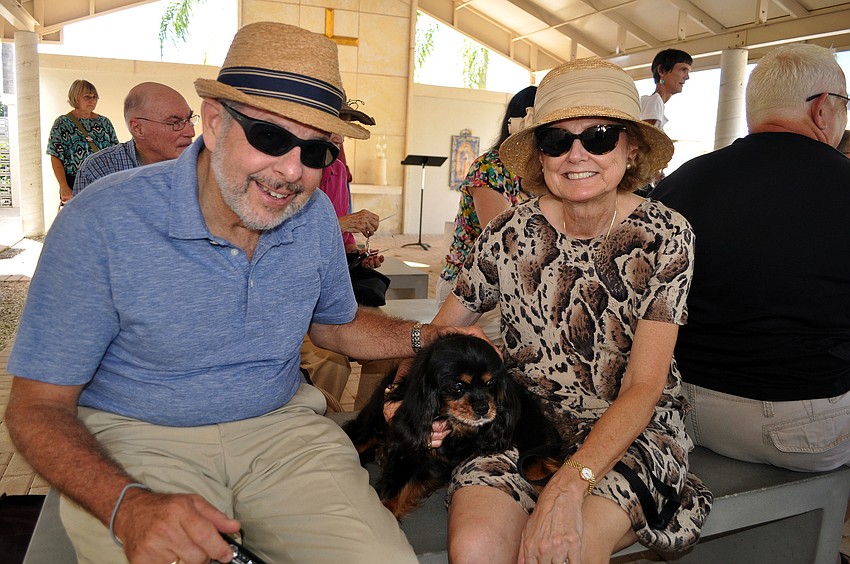 Oliver and Suzanne Janney with their dog, Crickett, 13