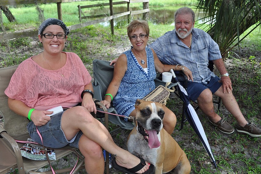 Lisa Moore, with her dog, Duke, joined her parents, Dianne and Neil Moore.