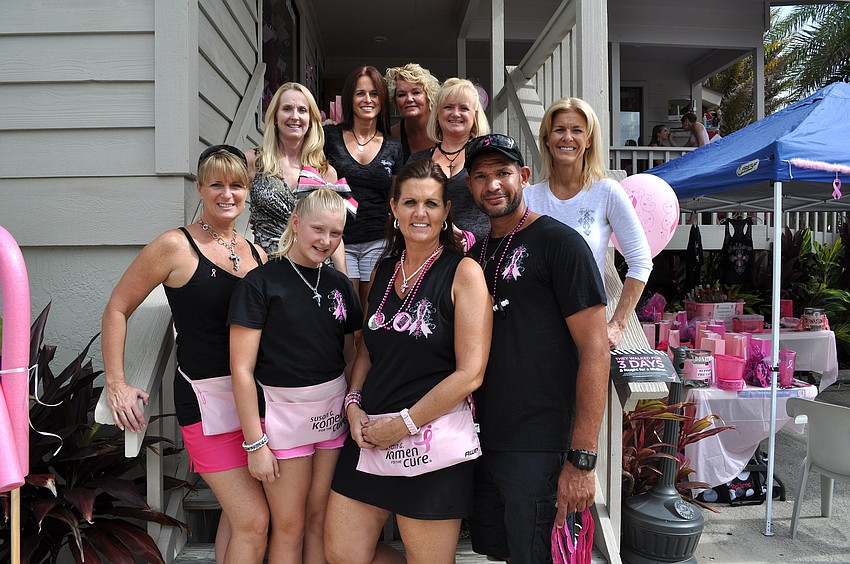 Team Believe members, in the back row, Lynne Renfroe, Gina Damico, Barbara Ruginski, Tina Burks and Cathy Bruce. In the front, Karen Johnson, Madison Johnson, Michelle Kerrigan and Cesar Rico.